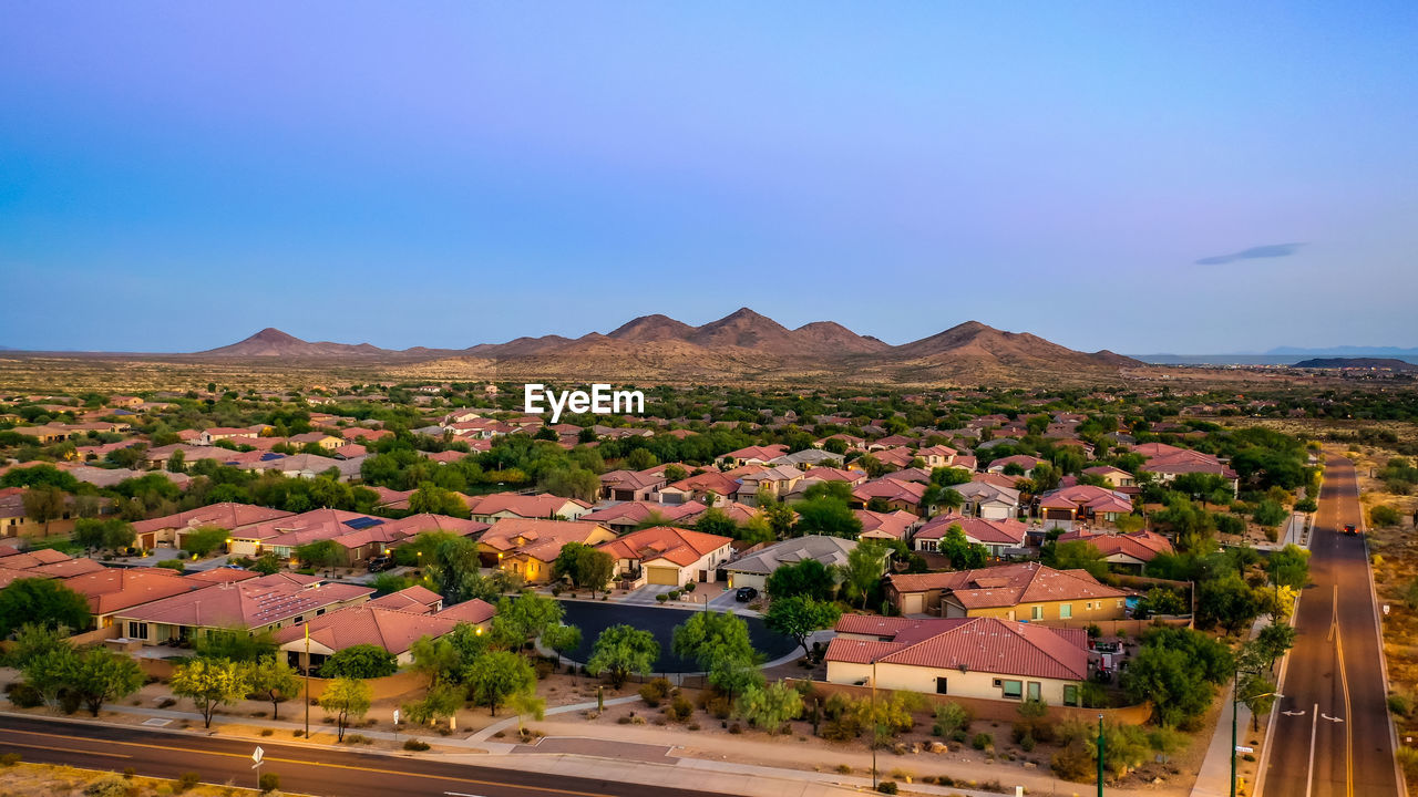 PANORAMIC VIEW OF BUILDINGS AGAINST SKY