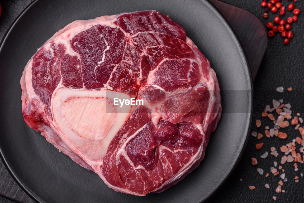 meat, food and drink, animal fat, red meat, food, rib eye steak, raw food, freshness, steak, veal, beef, goat meat, dish, lamb and mutton, meat chop, flesh, indoors, no people, capicola, cooking, kobe beef, directly above, red, high angle view, kassler, ingredient, still life