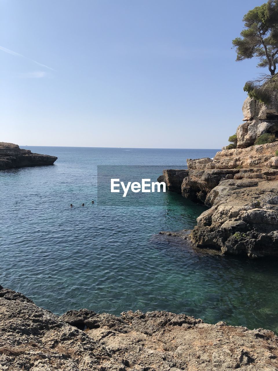 Scenic view of sea against clear sky