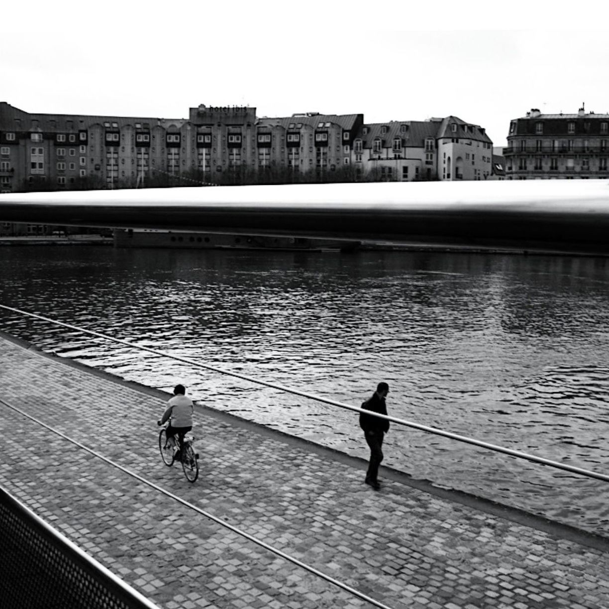 PEOPLE WALKING IN RIVER