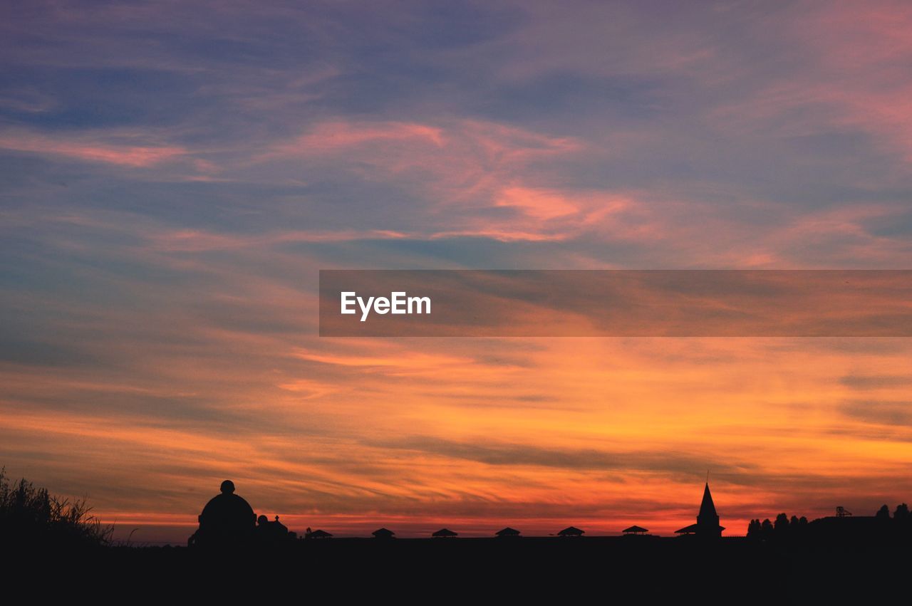 SILHOUETTE OF BUILDING DURING SUNSET