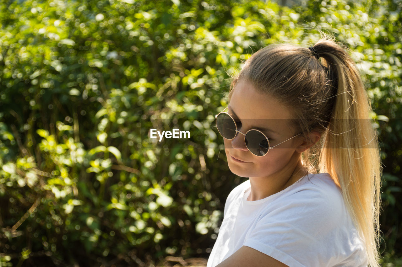 Close-up of woman wearing sunglasses