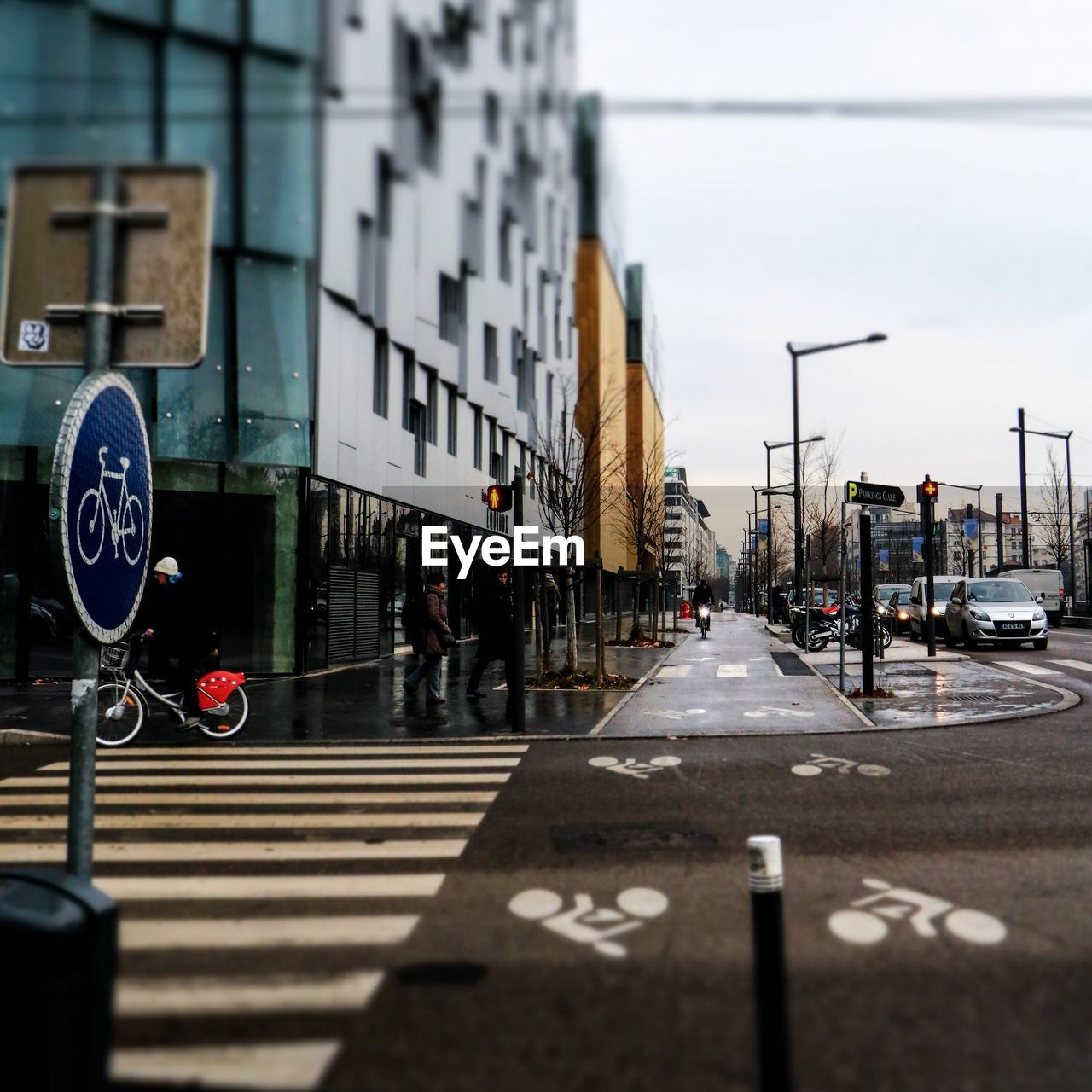 VIEW OF CITY STREET WITH BUILDINGS IN BACKGROUND