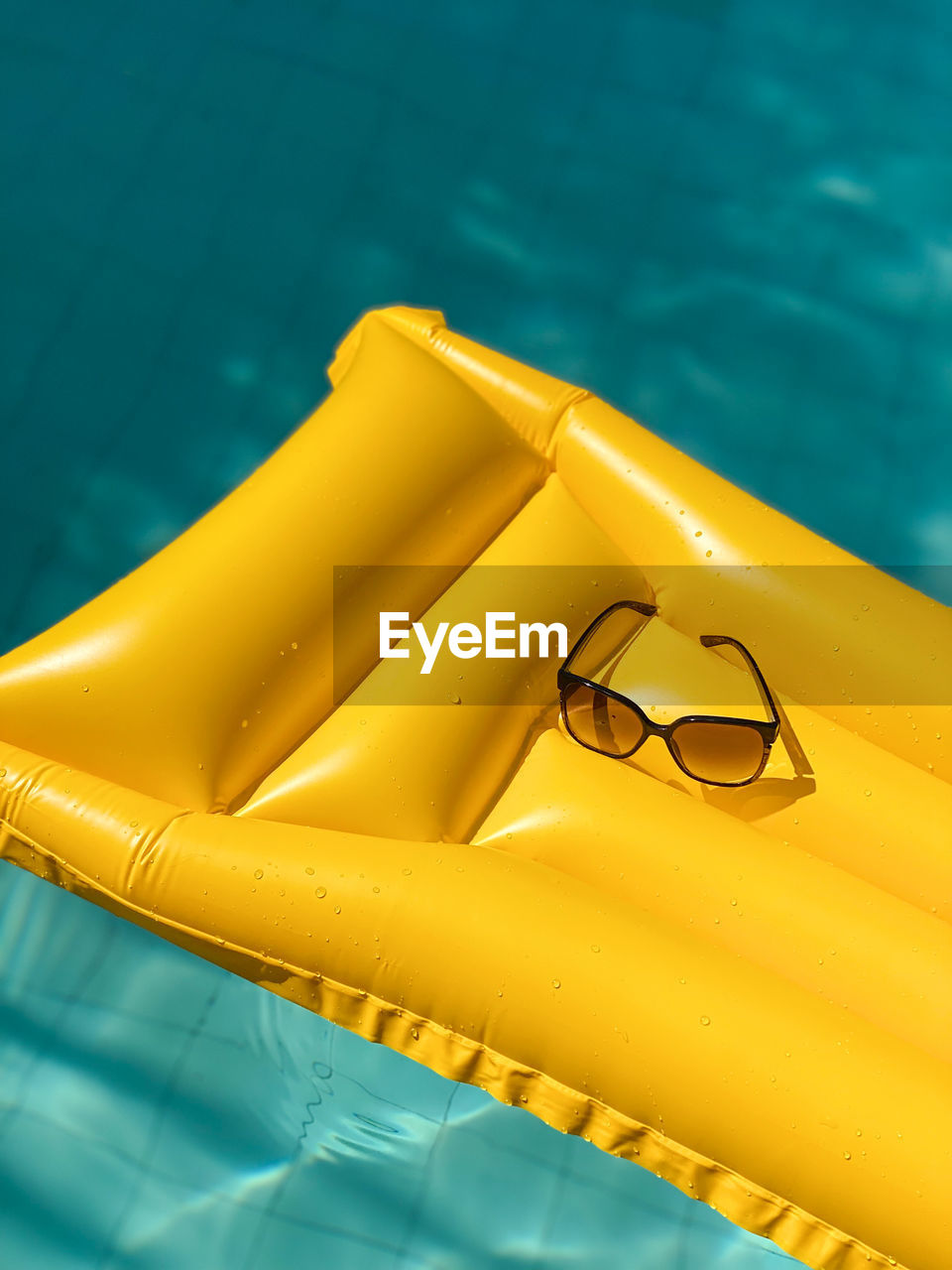 close-up of life belt on inflatable ring in swimming pool