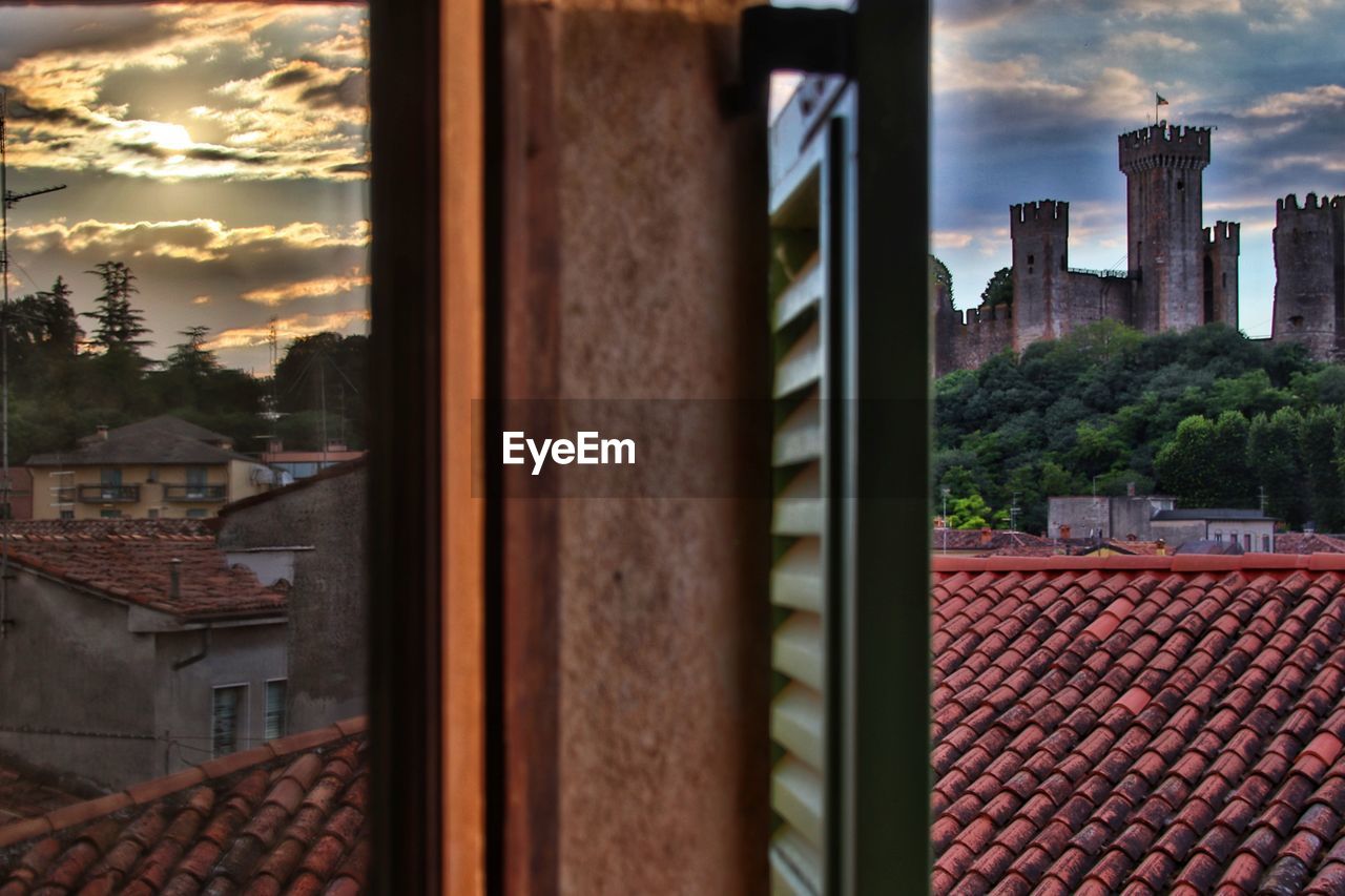 BUILDINGS AGAINST SKY DURING SUNSET