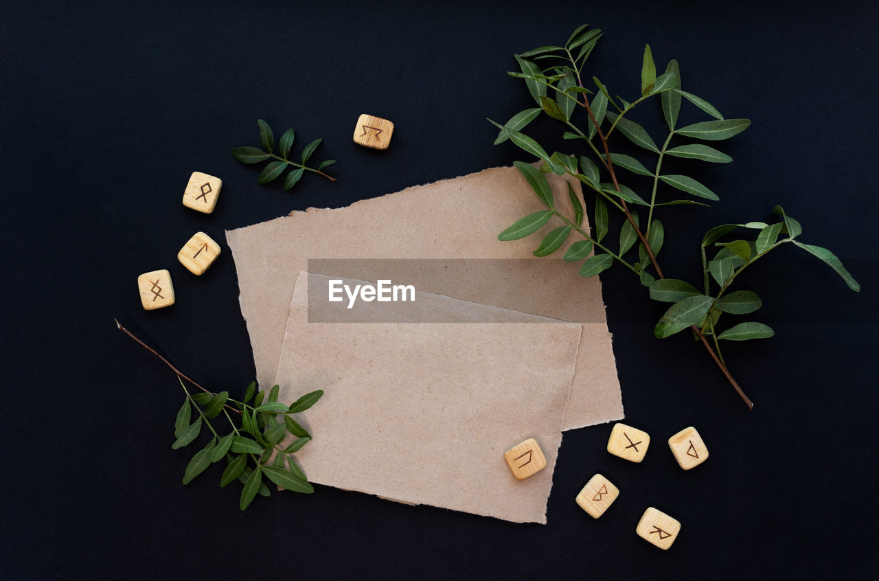 Kraft paper mockup template on black background with magical mysterious mood.