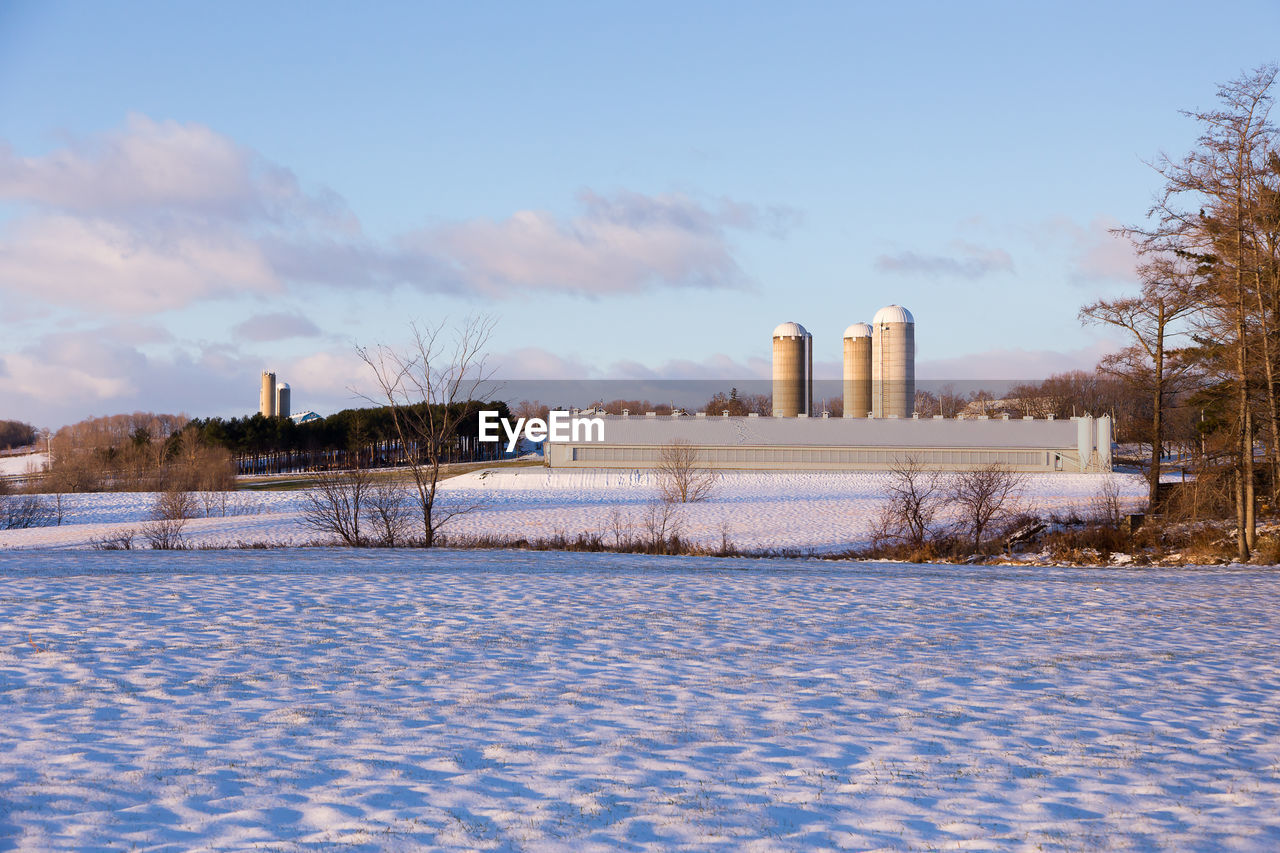 Winter rural landscape with large farm buildings seen in the bellechasse county 