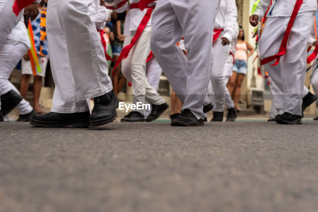 Low view of members of the cultural manifestation 