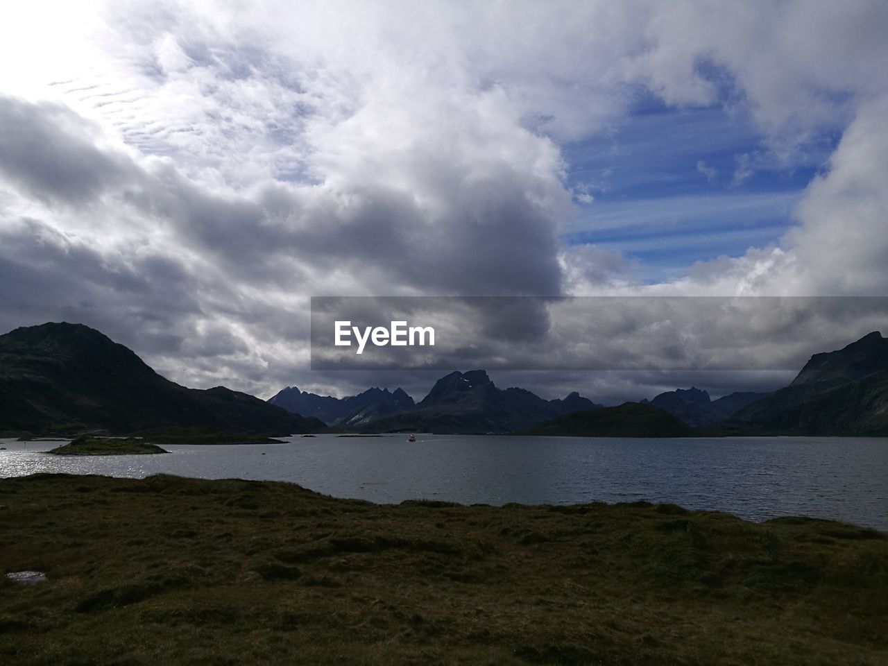 SCENIC VIEW OF SEA AND MOUNTAINS