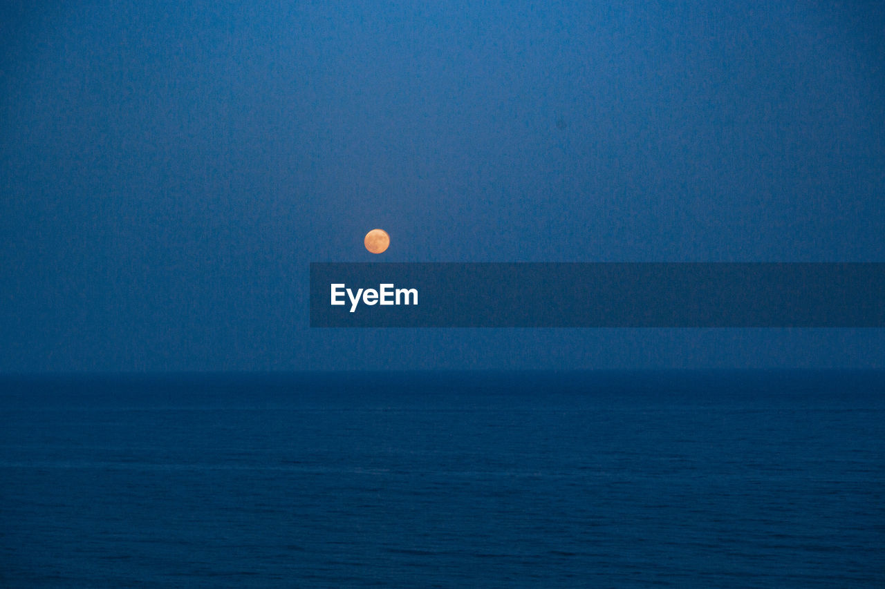 VIEW OF SEA AGAINST CLEAR BLUE SKY