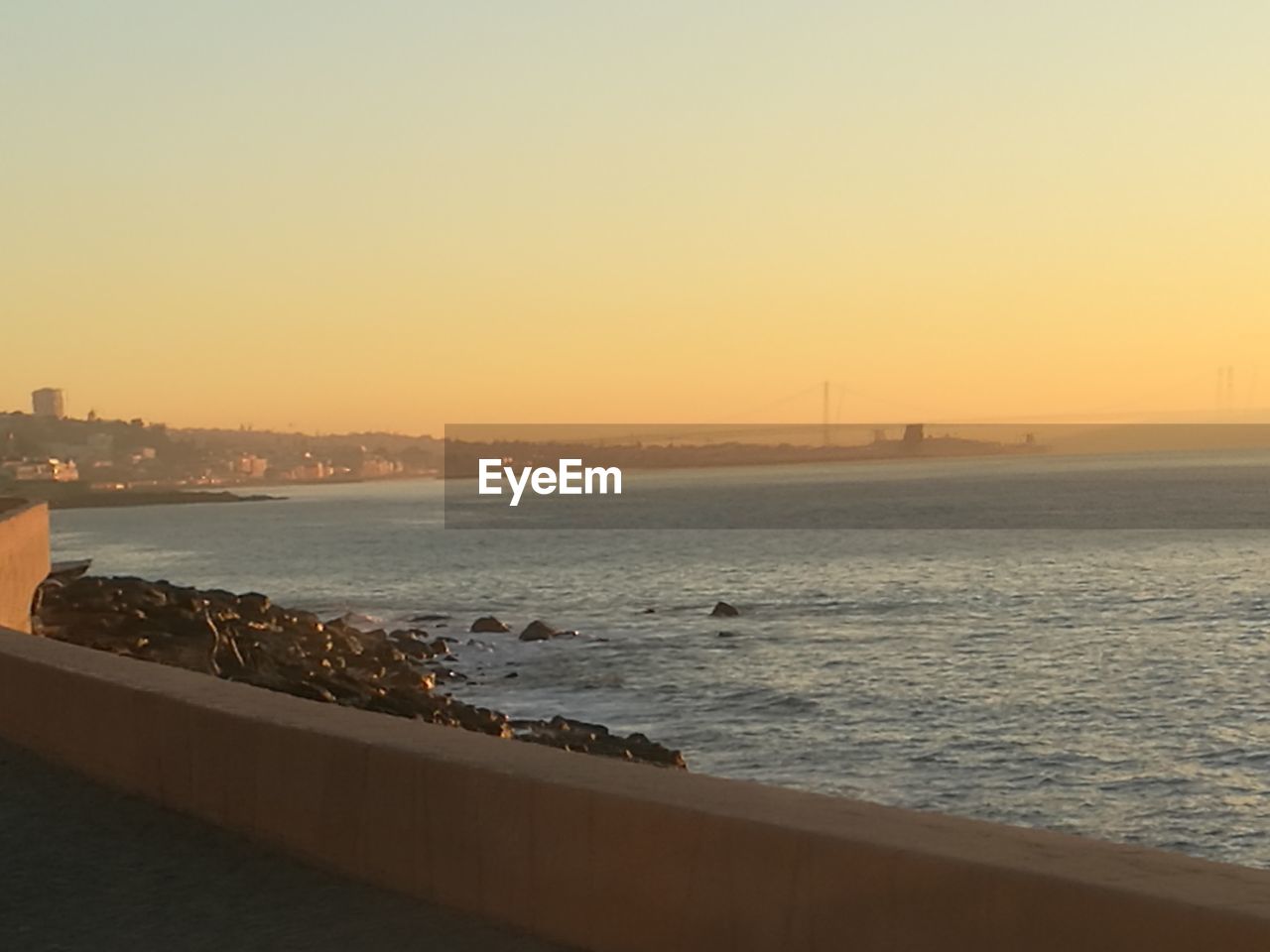 SCENIC VIEW OF SEA DURING SUNSET