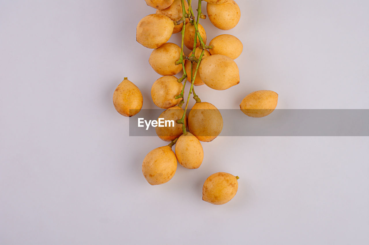 Thai fruit. fresh ripe mafai with sweet and sour on white