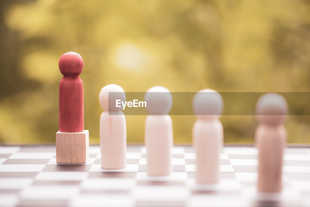 close-up of chess pieces against blurred background