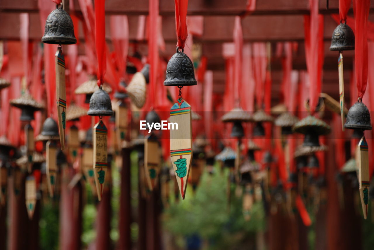 Close-up of wind chimes hanging outdoors