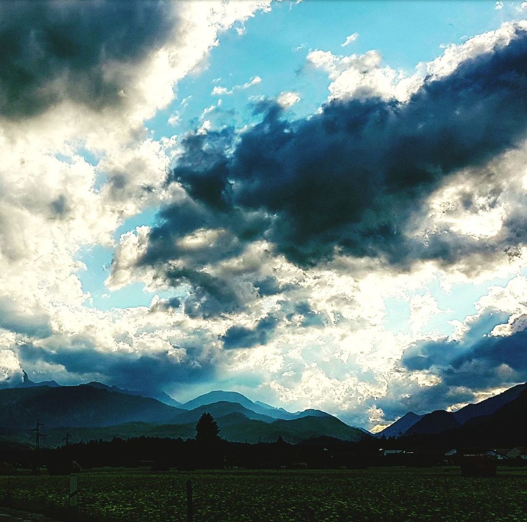 SCENIC VIEW OF LANDSCAPE AGAINST BLUE SKY