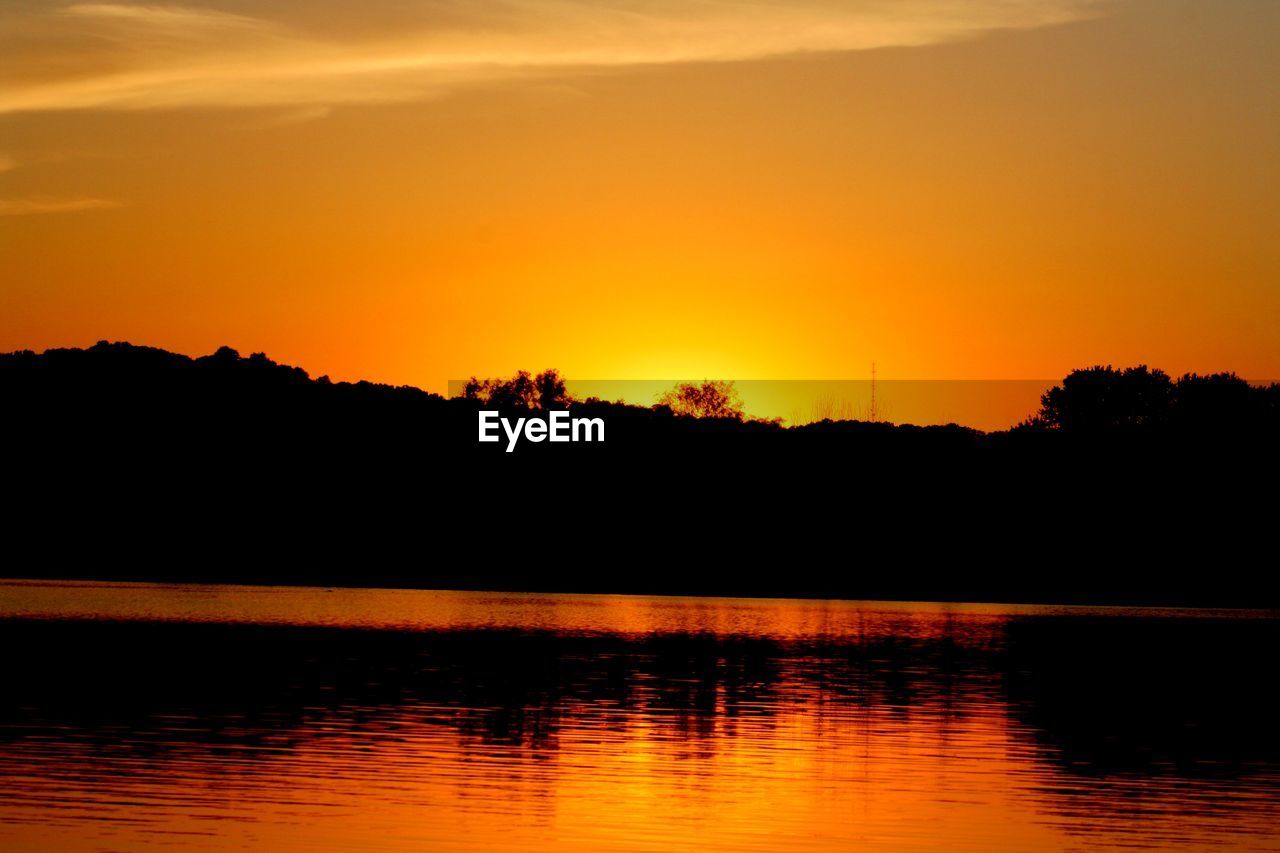 VIEW OF LAKE AT SUNSET