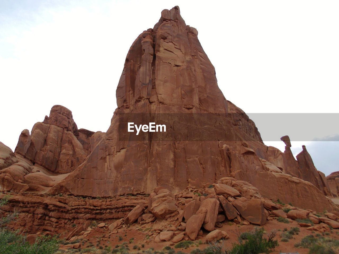 LOW ANGLE VIEW OF ROCK FORMATION AGAINST SKY