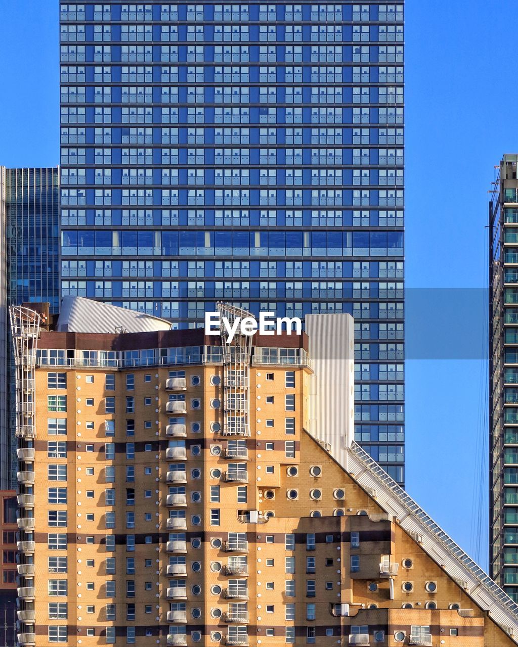 Modern buildings against blue sky