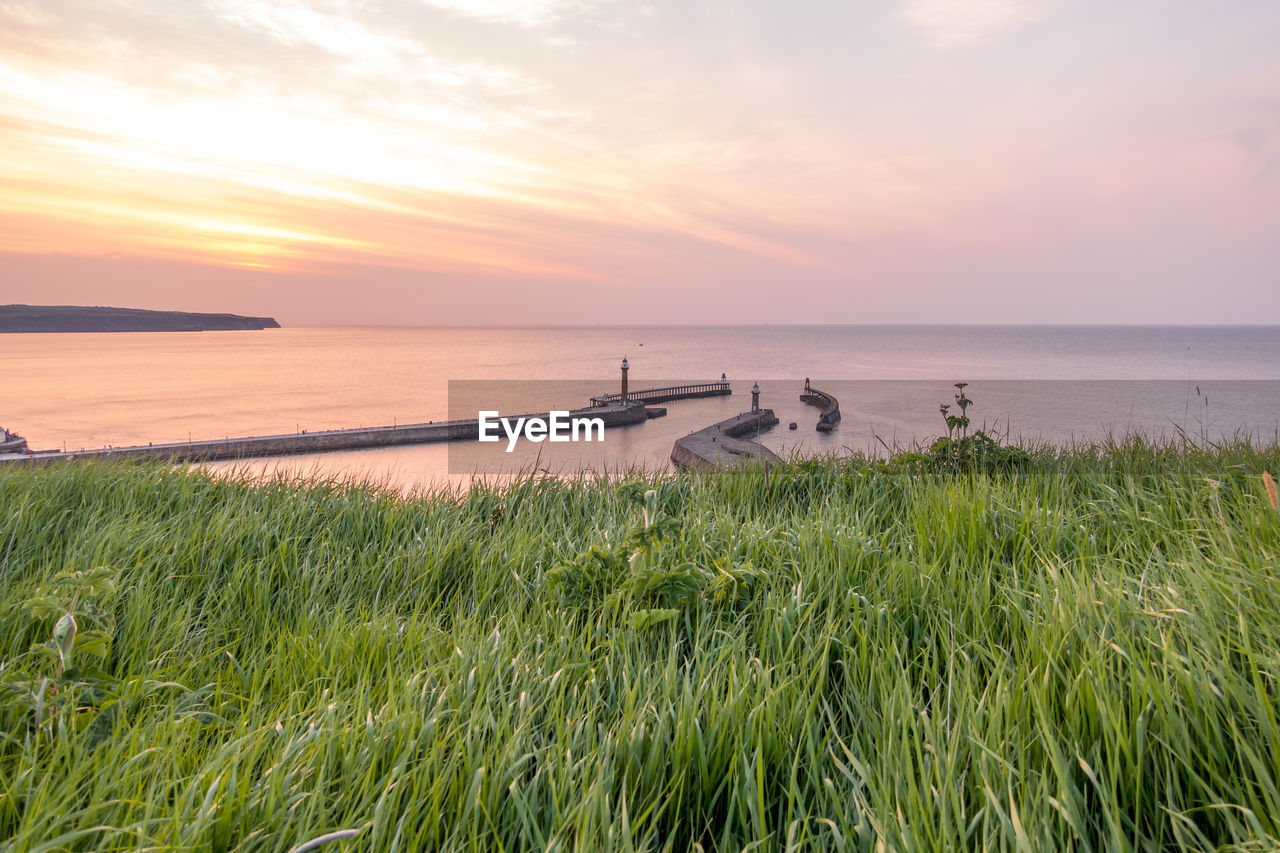 Scenic view of sea against sky during sunset