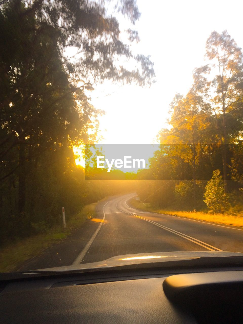 VIEW OF ROAD AT SUNSET