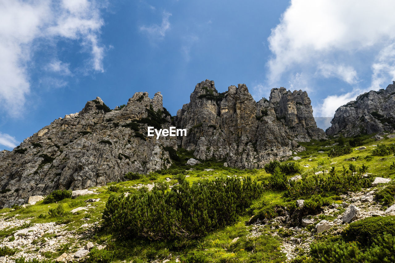 Panoramic view of rocky mountains against sky