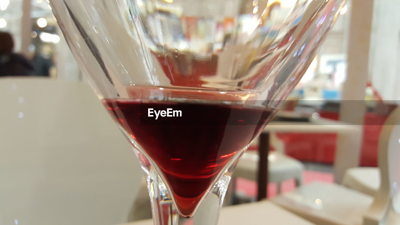 CLOSE-UP OF DRINK IN GLASS