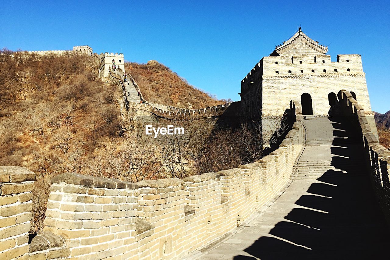 Mutianyu section of the great wall of china against clear blue sky