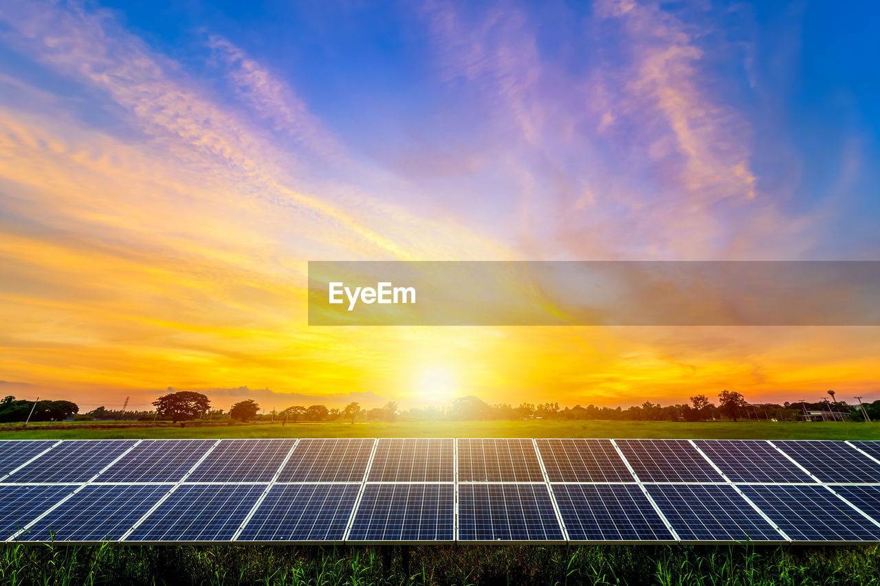 renewable energy, alternative energy, sun, solar energy, solar panel, environmental conservation, sky, environment, power generation, sunlight, technology, environmental issues, solar power, electricity, nature, sunset, cloud, power supply, sustainable resources, solar power station, innovation, sunbeam, efficiency, horizon, solar equipment, outdoors, blue, beauty in nature, finance, field, landscape, grass