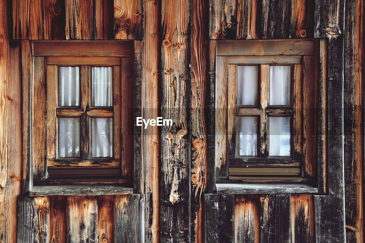 CLOSE-UP OF WEATHERED WINDOW