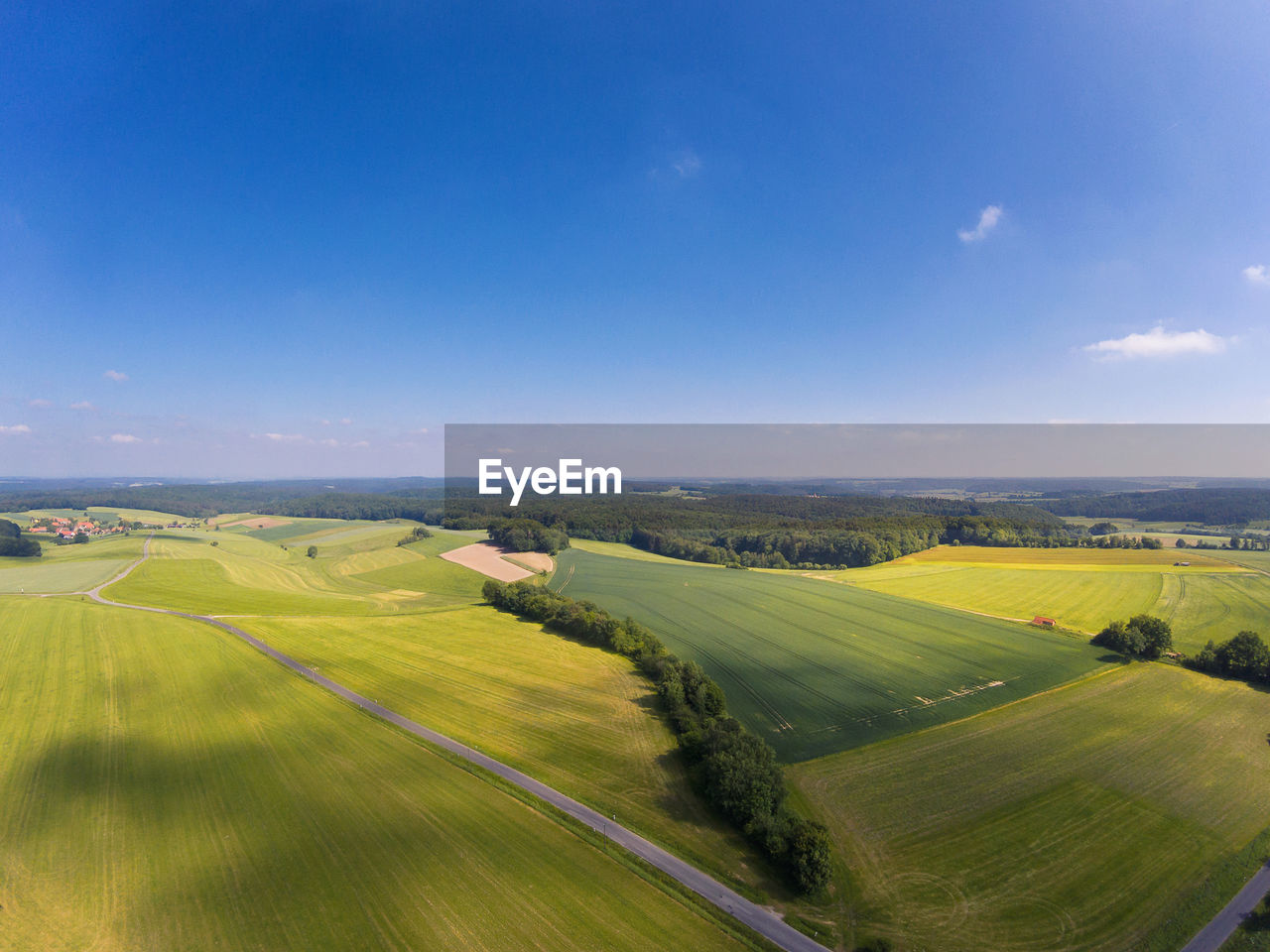 SCENIC VIEW OF FARM AGAINST SKY