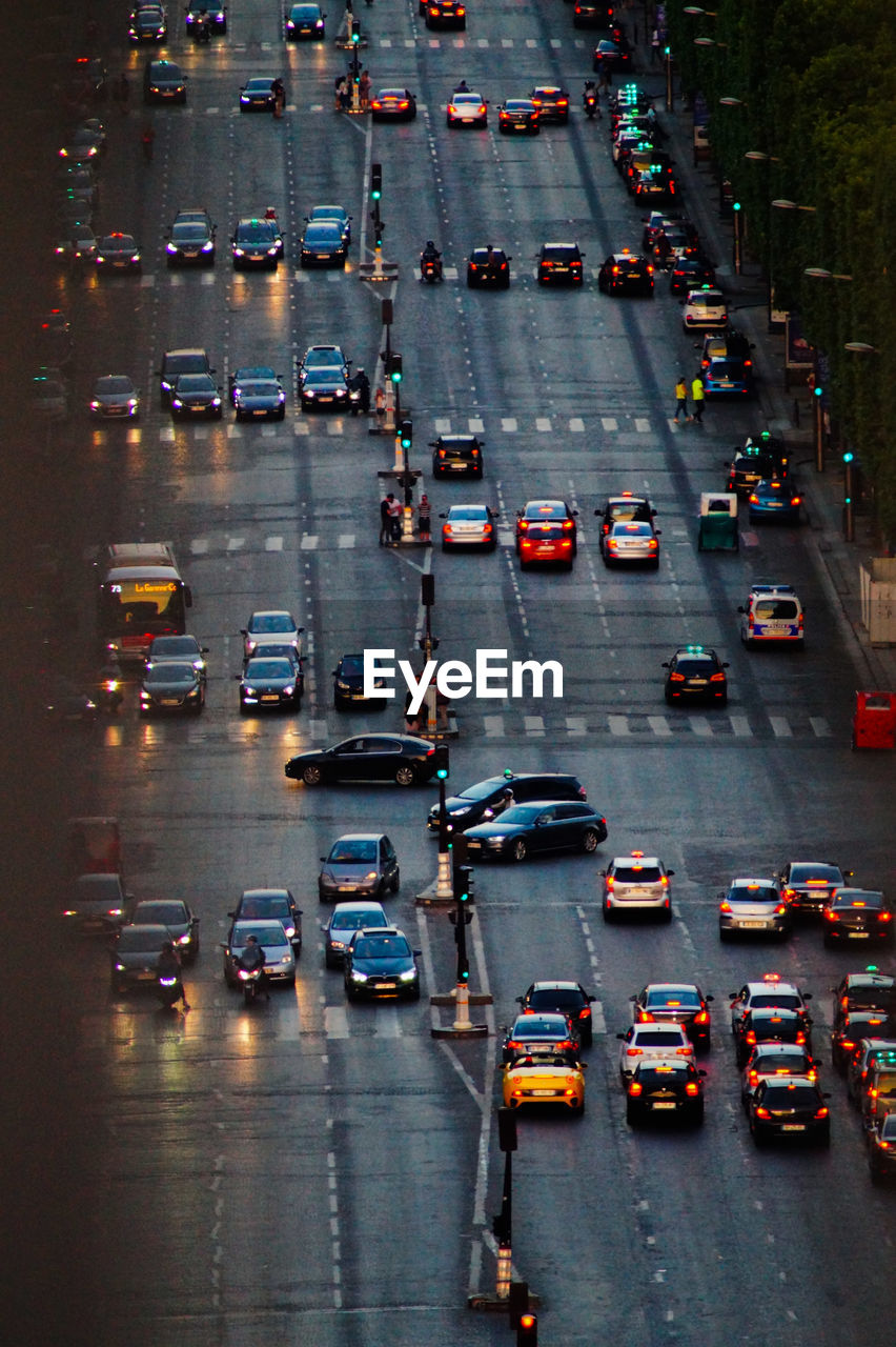 High angle view of cars on road during sunset