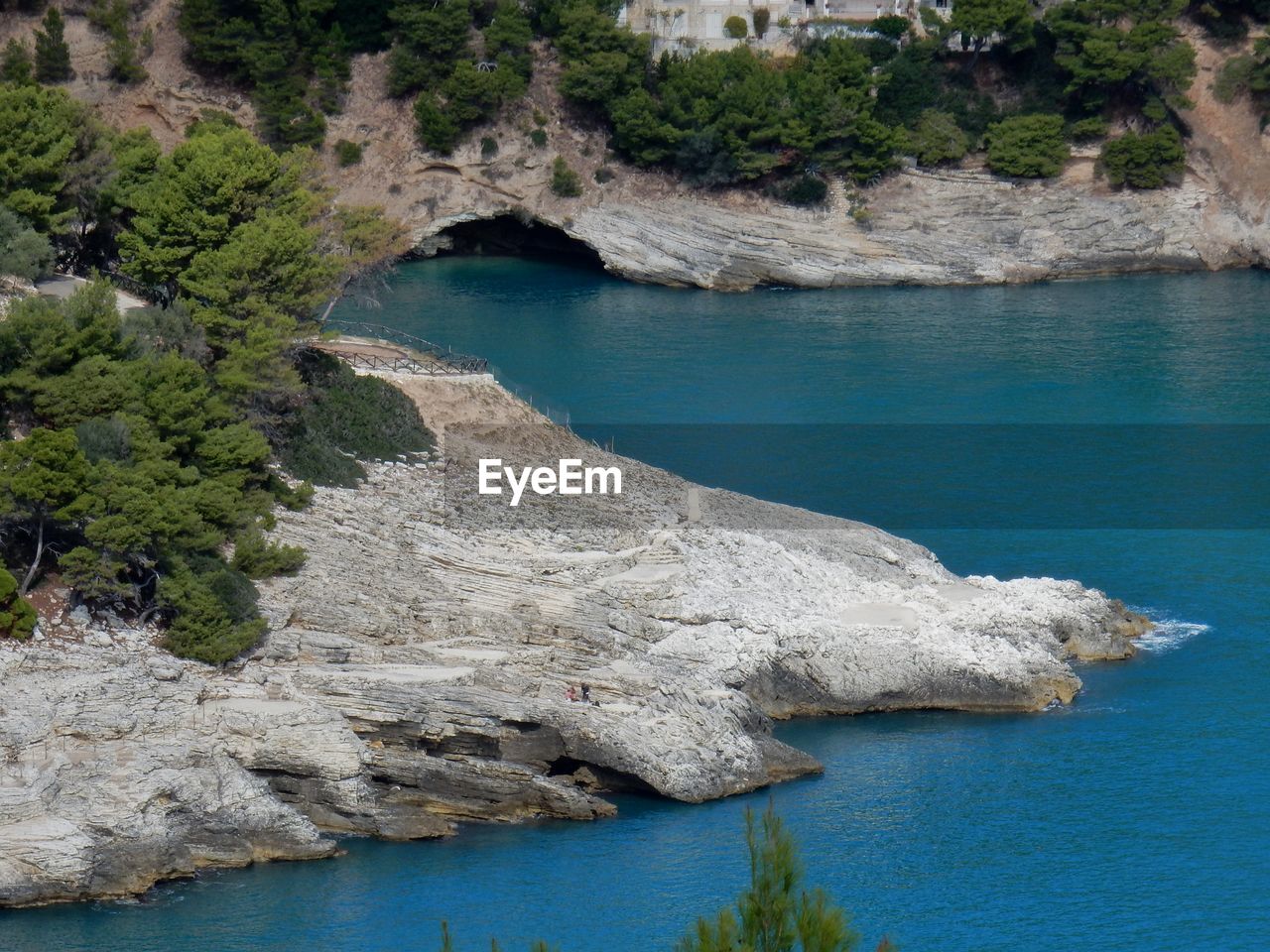 High angle view of rocks on sea