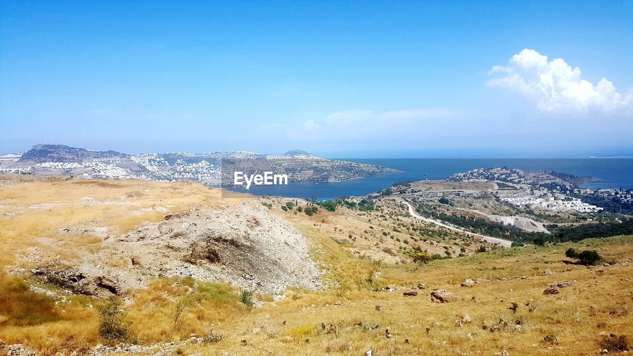 Panoramic view of sea and landscape against sky