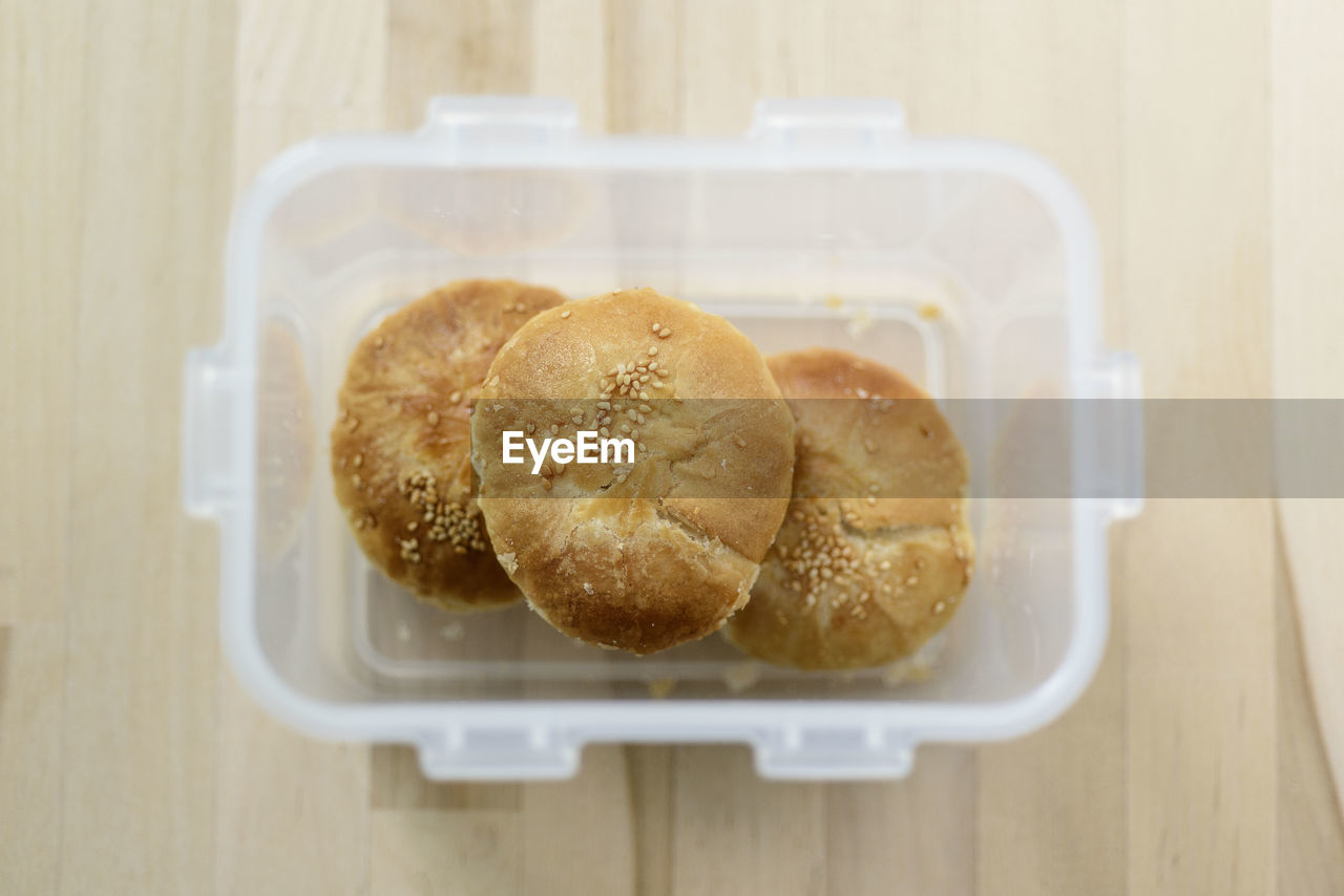 High angle view of biscuits in container on table