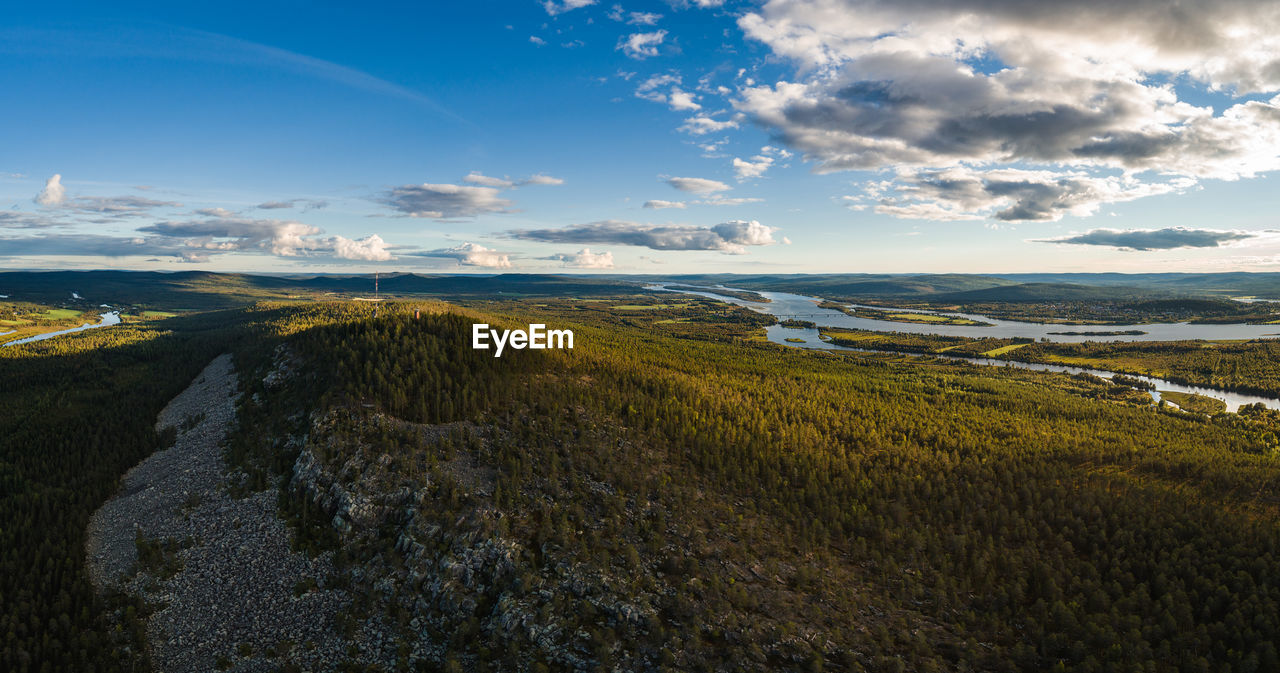 SCENIC VIEW OF LAND AGAINST SKY DURING SUNSET