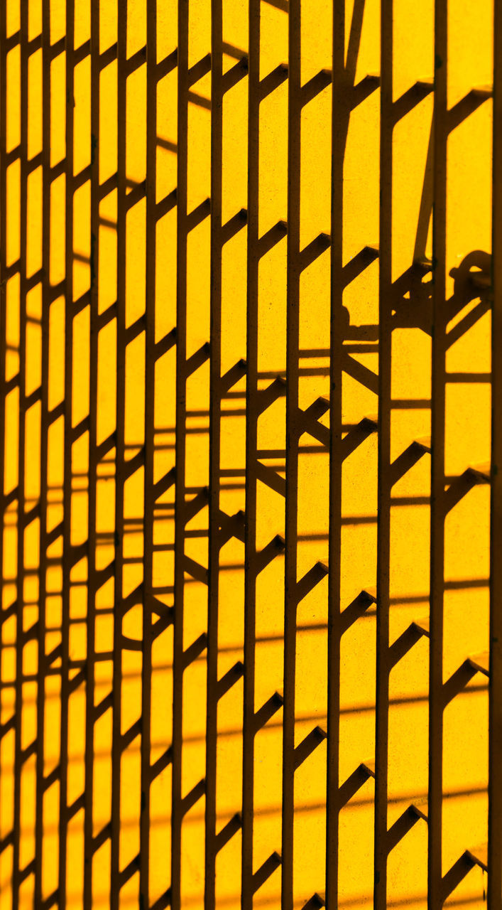Full frame shot of yellow patterned wall