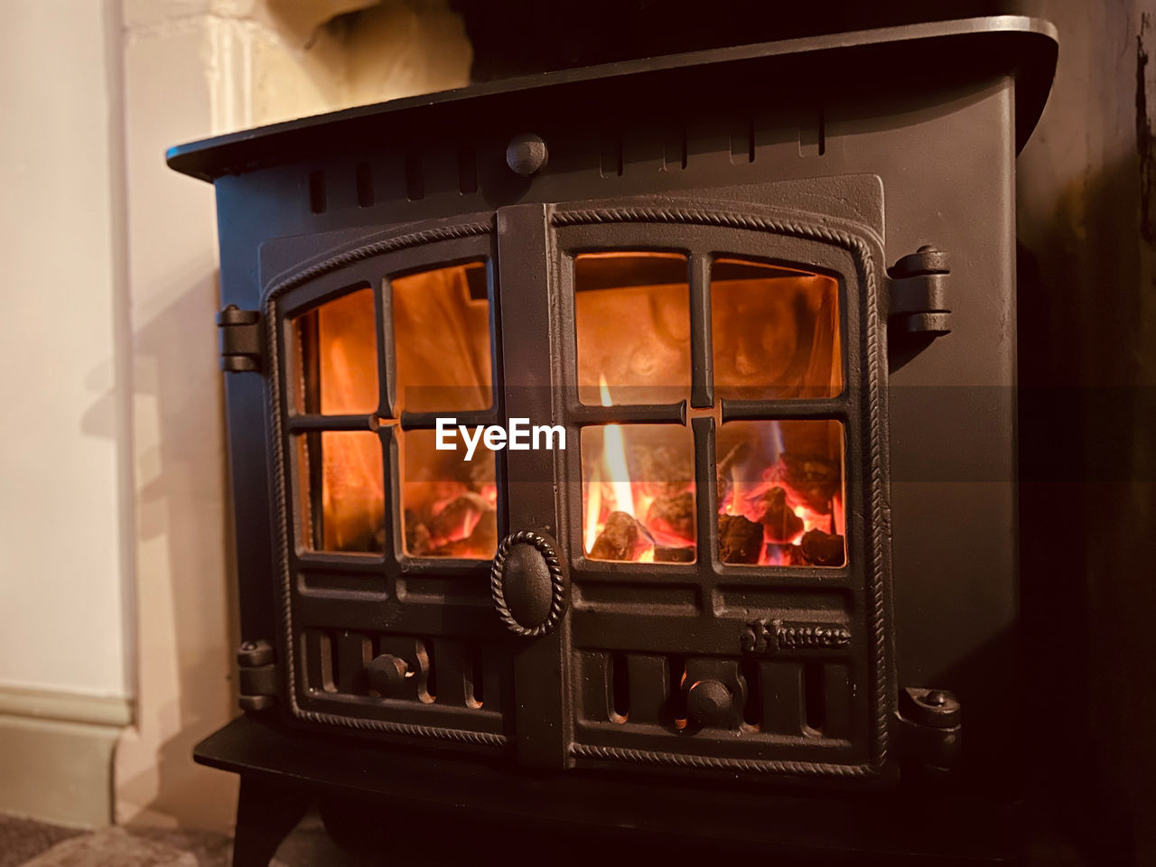 fireplace, heat, fire, hearth, burning, wood-burning stove, flame, indoors, nature, no people, home interior, oven, domestic room, appliance