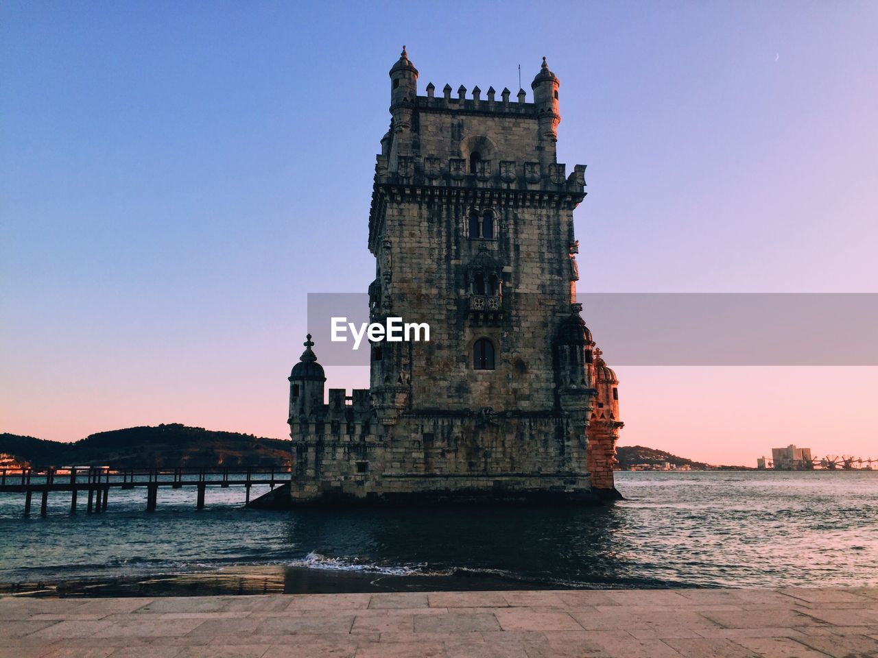 View of historical building against sky during sunset