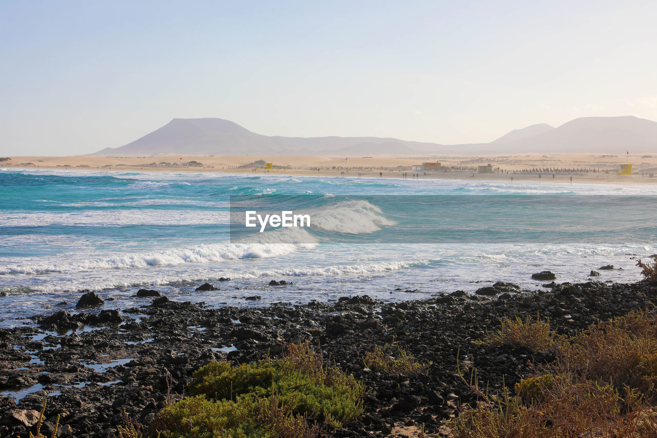 Scenic view of sea against clear sky