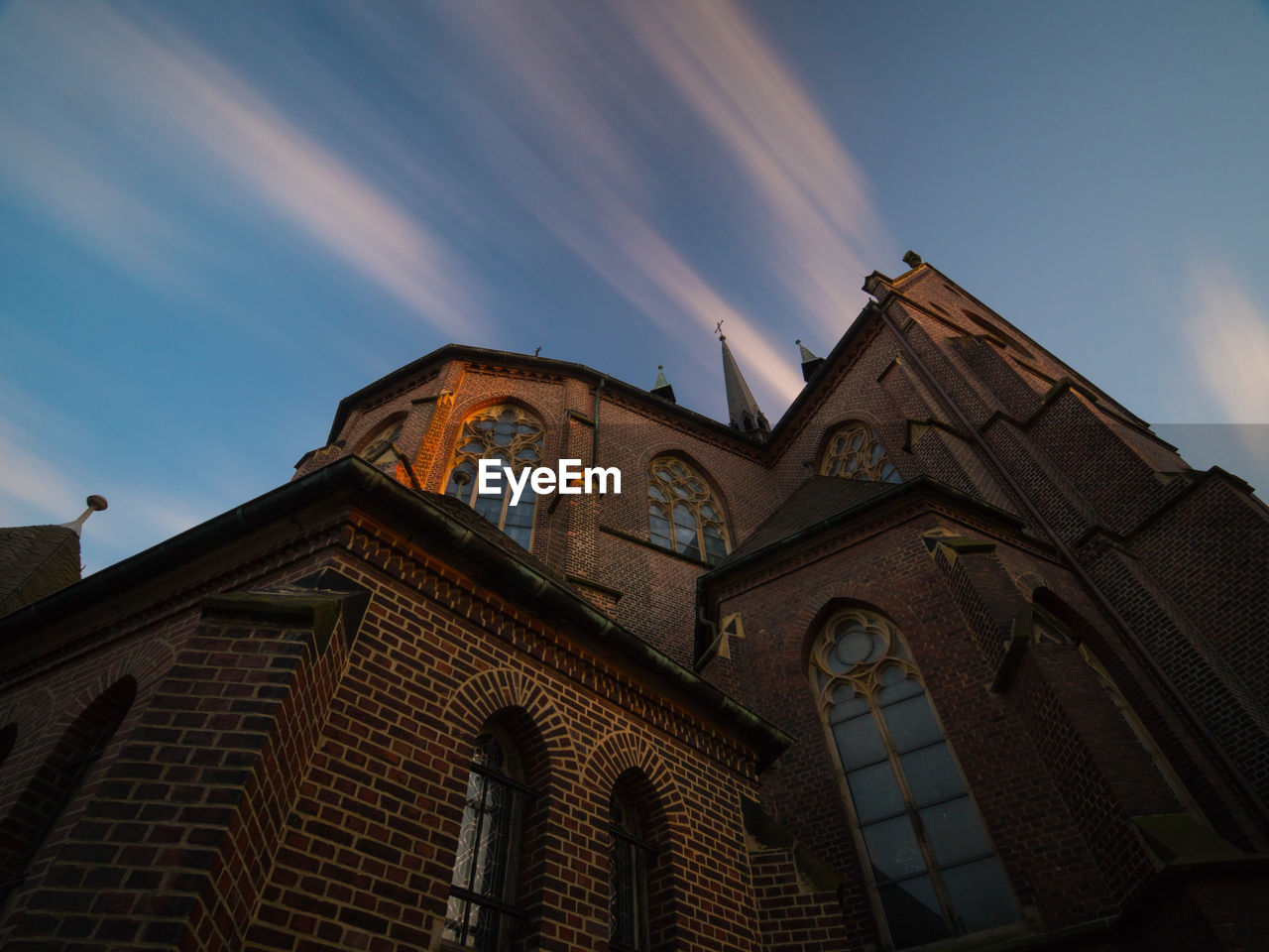 LOW ANGLE VIEW OF CATHEDRAL AGAINST SKY AND BUILDING