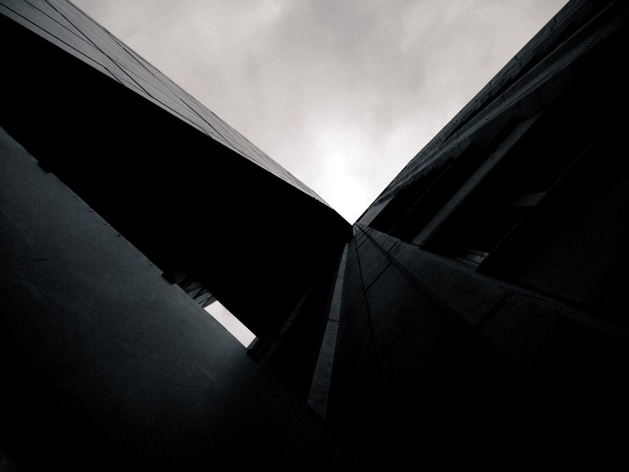 Corner of building against sky
