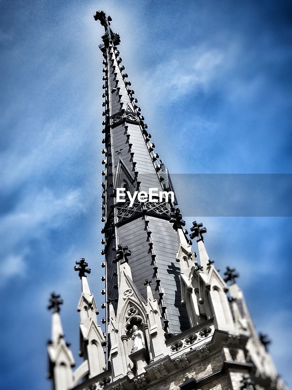 LOW ANGLE VIEW OF TEMPLE AGAINST BUILDING