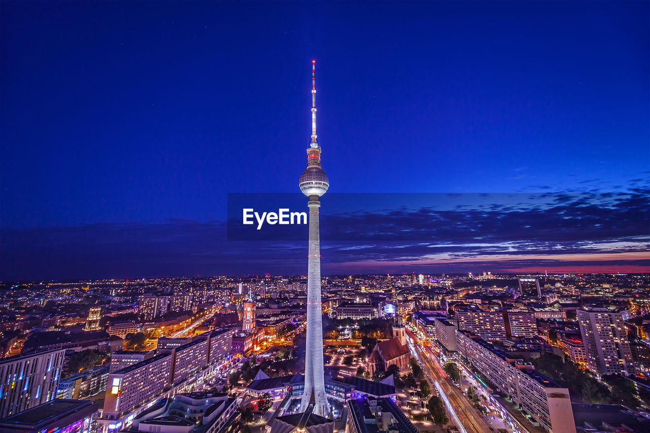 Aerial view of cityscape at night