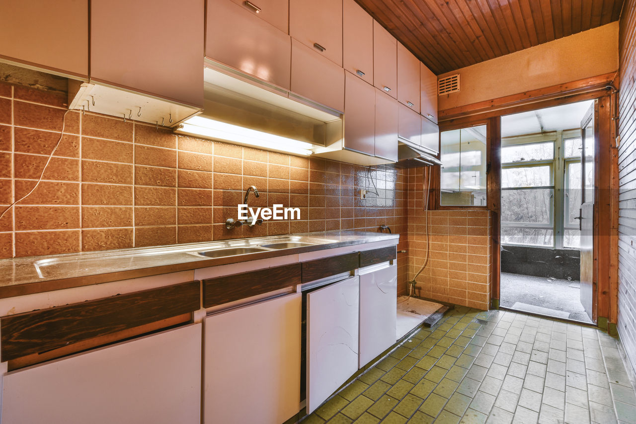 Interior of illuminated kitchen