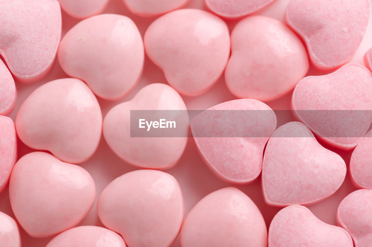 Background and textured pink heart candies for valentine's day