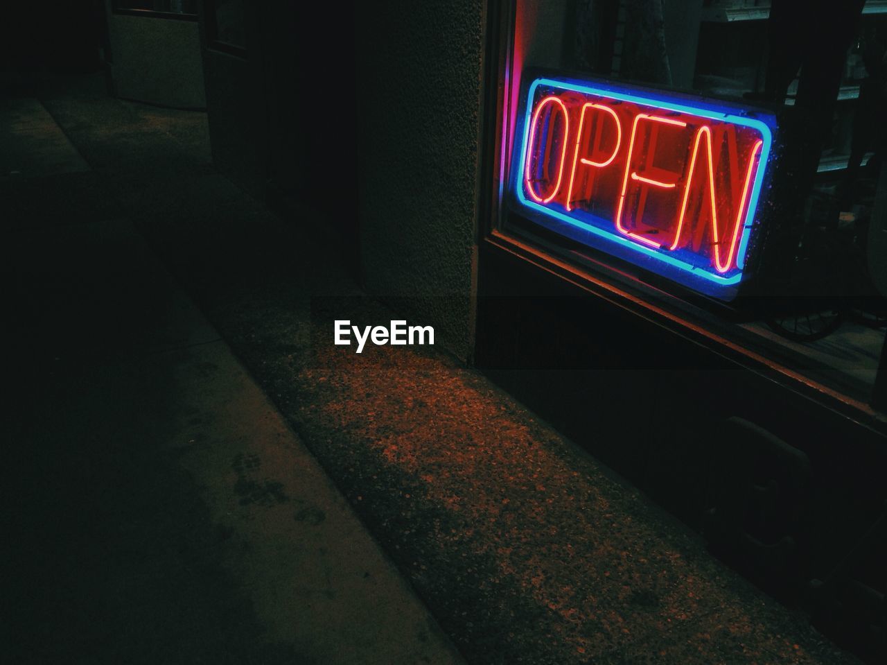 Close-up of glowing open sign