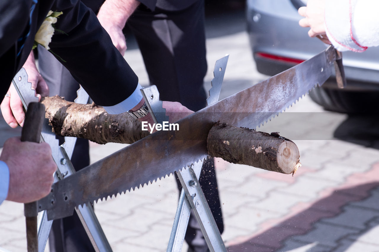 MAN WORKING ON METAL