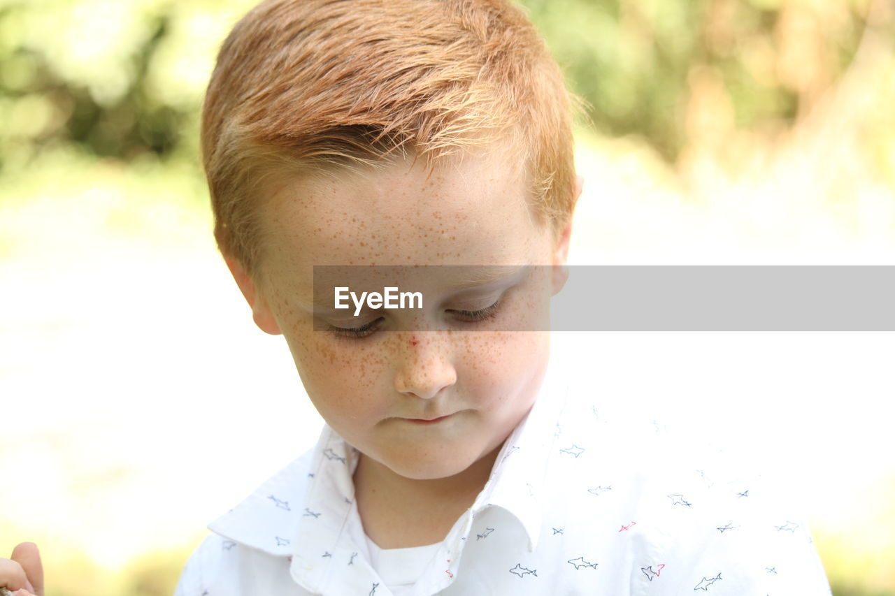 CLOSE-UP PORTRAIT OF A BOY