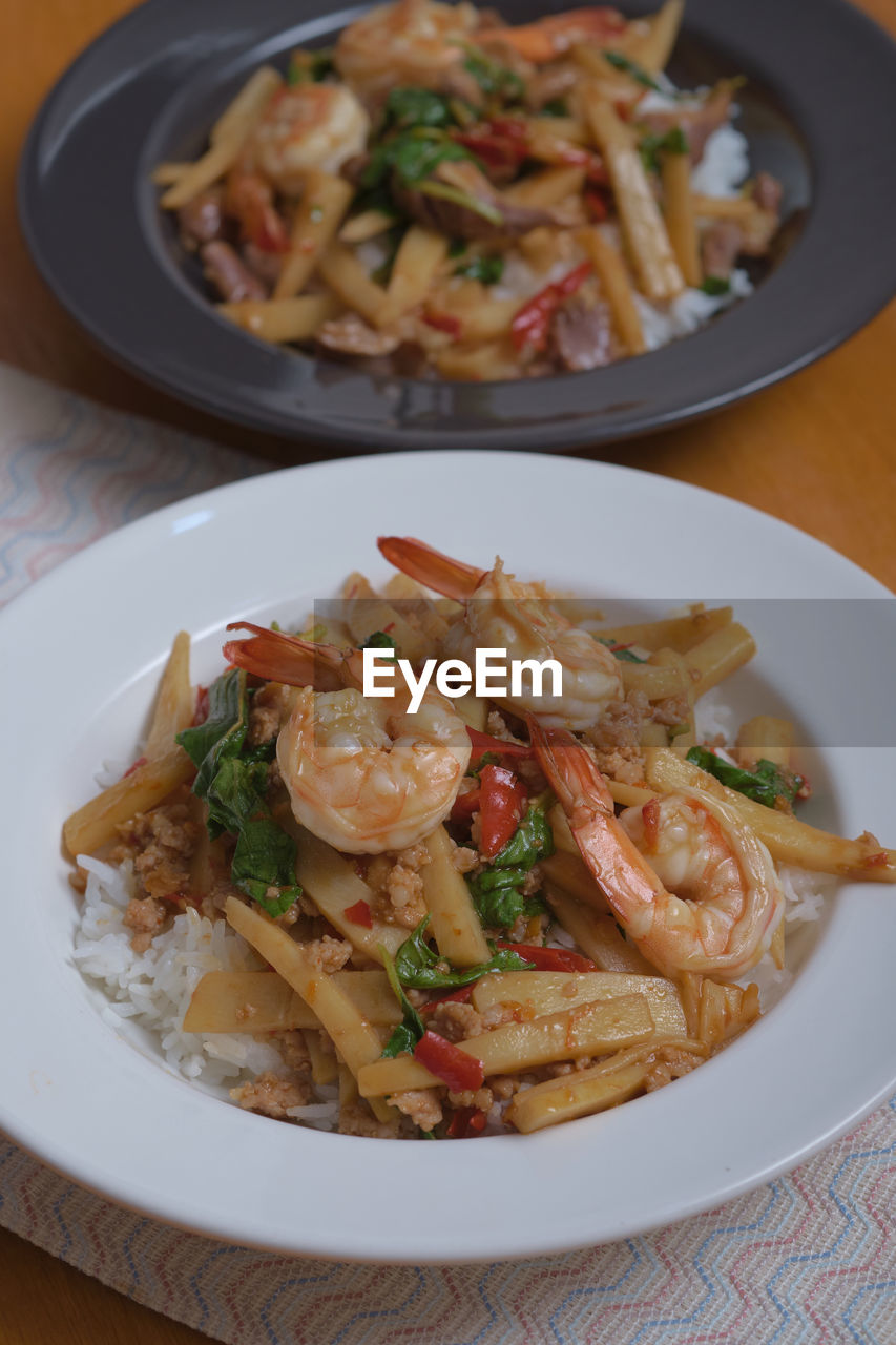 Close-up of pasta served in plate on table