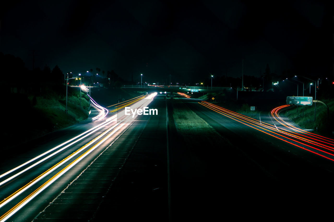 Light trails on road at night